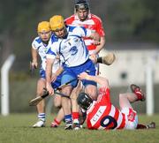 17 January 2010; James Murray, Waterford, in action against Padraig Gould, CIT. Waterford Crystal Cup, Waterford v CIT. Park Kilmacthomas, Kilmacthomas, Co. Waterford. Picture credit: Ken Sutton / SPORTSFILE