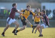 17 January 2010; Dermot Sheridan, DCU, in action against Aidan Finnan, left, and Doran Harte, Westmeath. O'Byrne Cup, First Round, Westmeath v DCU, St. Lomans GAA Grounds, Mullingar, Co. Westmeath. Picture credit: Brian Lawless / SPORTSFILE