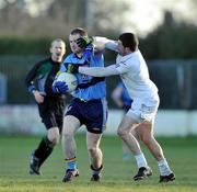 17 January 2010; Andrew Mcloughlin, Kildare, in action against David O' Callaghan, UCD. O'Byrne Cup, First Round, Kildare v UCD, St. Conleth's Park, Newbridge, Co. Kildare. Picture credit: Barry Cregg / SPORTSFILE