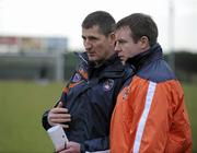 16 January 2010; Armagh manager Paddy O'Rourke, left, and his assistant Justin McNulty. Barrett Sports Lighting Dr. McKenna Cup, Group A, Armagh v UUJ,  St Oliver Plunkett Park, Crossmaglen, Co. Armagh. Picture credit: Oliver McVeigh / SPORTSFILE *** Local Caption ***