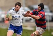20 February 2016; Joe White, Cork Con, is tackled by Tom Byrne, Clontarf. Ulster Bank League, Division 1A, Cork Con v Clontarf, Temple Hill, Cork. Picture credit: Brendan Moran / SPORTSFILE
