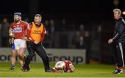 20 February 2016; Cork selector Diarmuid O'SullEvan, centre, and manager Kieran Kingston, right, react as Aidan Walsh lies injured after being fouled off the ball. Allianz Hurling League, Division 1A, Round 2, Cork v Waterford, Páirc Ui Rinn, Cork. Picture credit: Brendan Moran / SPORTSFILE
