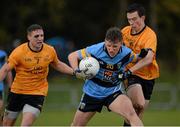 20 February 2016; Tom Hayes, University College Dublin, in action againsy Stephen Attride and Shane Carey, Dublin City University. Independent.ie HE GAA Sigerson Cup Final, University College Dublin v Dublin City University, UUJ, Jordanstown, Co. Antrim. Picture credit: Oliver McVeigh / SPORTSFILE