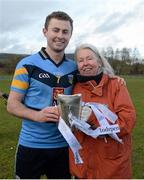 20 February 2016; Jack McCaffrey, captain, University College Dublin, along with Annette Billings, wife of the late Dave Billings, former UCD mentor, who died last year, after receiving the Sigerson cup. Independent.ie HE GAA Sigerson Cup Final, University College Dublin v Dublin City University, UUJ, Jordanstown, Co. Antrim. Picture credit: Oliver McVeigh / SPORTSFILE