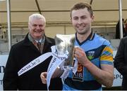 20 February 2016; Jack McCaffrey, captain, University College Dublin, receives the Sigerson cup from Uachtarán Chumann Lúthchleas Gael Aogán Ó Fearghail. Independent.ie HE GAA Sigerson Cup Final, University College Dublin v Dublin City University, UUJ, Jordanstown, Co. Antrim. Picture credit: Oliver McVeigh / SPORTSFILE