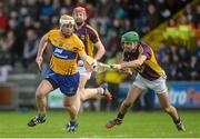 21 February 2016; Conor McGrath, Clare, in action against Shaun Murphy, Wexford. Allianz Hurling League, Division 1B, Round 2, Wexford v Clare. Innovate Wexford Park, Wexford. Picture credit: Piaras Ó Mídheach / SPORTSFILE