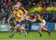 21 February 2016; Conor McGrath, Clare, in action against Shaun Murphy, Wexford. Allianz Hurling League, Division 1B, Round 2, Wexford v Clare. Innovate Wexford Park, Wexford. Picture credit: Piaras Ó Mídheach / SPORTSFILE