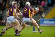 21 February 2016; Aaron Shanagher, Clare, in action against Wexford's, from left, James Breen, Eoin Moore, and Liam Ryan. Allianz Hurling League, Division 1B, Round 2, Wexford v Clare. Innovate Wexford Park, Wexford. Picture credit: Piaras Ó Mídheach / SPORTSFILE