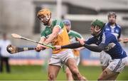21 February 2016; Colin Egan, Offaly, in action against Patrick Purcell, Laois. Allianz Hurling League, Division 1B, Round 2, Offaly v Laois, O'Connor Park, Tullamore, Co. Offaly. Picture credit: David Maher / SPORTSFILE