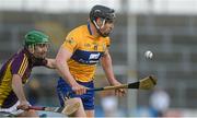 21 February 2016; John Conlan, Clare, in action against Shaun Murphy, Wexford. Allianz Hurling League, Division 1B, Round 2, Wexford v Clare. Innovate Wexford Park, Wexford. Picture credit: Piaras Ó Mídheach / SPORTSFILE