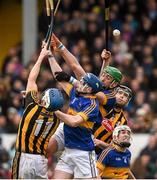 21 February 2016; Kilkenny's T.J Reid, left, and Joey Holden contest a high ball against, from left, Tomas Hamill, Cathal Barrett and Michael Cahill, Tipperary. Allianz Hurling League, Division 1A, Round 2, Kilkenny v Tipperary, Nowlan Park, Kilkenny. Picture credit: Ray McManus / SPORTSFILE