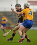 21 February 2016; Liam Óg McGovern, Wexford, in action against Patrick O'Connor, Clare. Allianz Hurling League, Division 1B, Round 2, Wexford v Clare. Innovate Wexford Park, Wexford. Picture credit: Piaras Ó Mídheach / SPORTSFILE