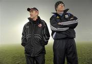 23 January 2010; Tyrone manager Mickey Harte and Cavan manager Tommy Carr survey the scene as the match is delayed 45 minutes due to fog ahead of the Barrett Sports Lighting Dr McKenna Cup Group B match between Tyrone and Cavan at Healy Park in Omagh, Tyrone. Photo by Oliver McVeigh/Sportsfile
