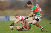 24 January 2010; Johnny Hughes, Tir Chonaill Gaels, in action against Shane Hickey, Kilmurray Ibrickane. AIB GAA Football All-Ireland Senior Club Championship Quarter-Final, Tir Chonaill Gaels v Kilmurray Ibrickane, Emerald Park, Ruislip, London, England. Picture credit: Brendan Moran / SPORTSFILE