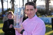 24 Janurary 2010; Jockey Davy Russell with the Toshiba Irish Champion Hurdle trophy. Leopardstown Racecourse, Dublin. Picture credit: Matt Browne / SPORTSFILE