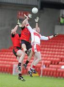 24 January 2010; Fergal Doherty, Derry, in action against Ambrose Rodgers, Down. Barrett Sports Lighting Dr. McKenna Cup, Group C, Derry v Down, Celtic Park, Derry. Picture credit: Oliver McVeigh / SPORTSFILE