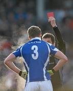 24 January 2010; Denis Booth, Laois, is shown the red card by referee Syl Doyle. O'Byrne Cup Quarter-Final, Laois v Kildare, O'Moore Park, Portlaoise, Co. Laois. Photo by Sportsfile