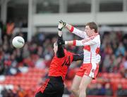 24 January 2010; James McGovern, Down, in action against Gerard O'Kane, Derry. Barrett Sports Lighting Dr. McKenna Cup, Group C, Derry v Down, Celtic Park, Derry. Picture credit: Oliver McVeigh / SPORTSFILE