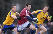 24 January 2010; Cian Mimnagh, NUIG, in action against Sean McDermott, Roscommon. Connacht FBD League, Group A, Round 2, NUIG v Roscommon, Dangan GAA Grounds, Dangan, Co. Galway. Picture credit: Ray Ryan / SPORTSFILE