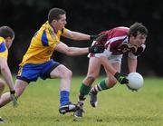 24 January 2010; Cathal Kenny, NUIG, in action against Sean McDermott, Roscommon. Connacht FBD League, Group A, Round 2, NUIG v Roscommon, Dangan GAA Grounds, Dangan, Co. Galway. Picture credit: Ray Ryan / SPORTSFILE
