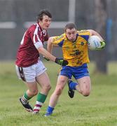 24 January 2010; Padraig Duignan, Roscommon, in action against Cathal Kenny, NUIG. Connacht FBD League, Group A, Round 2, NUIG v Roscommon, Dangan GAA Grounds, Dangan, Co. Galway. Picture credit: Ray Ryan / SPORTSFILE