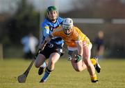 24 January 2010; Aaron Graffin, Antrim, in action against David O'Callaghan, UCD. Walsh Cup First Round, UCD v Antrim, UCD, Belfield, Co. Dublin. Picture credit: Daire Brennan / SPORTSFILE