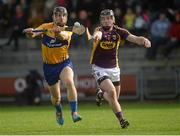 21 February 2016; John Conlan, Clare, in action against Andrew Kenny, Wexford. Allianz Hurling League, Division 1B, Round 2, Wexford v Clare. Innovate Wexford Park, Wexford. Picture credit: Piaras Ó Mídheach / SPORTSFILE