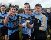 20 February 2016; Ryan Wylie, Stephen Coen and Conor McCarthy, University College Dublin, celebrate with the Sigerson cup after the game. Independent.ie HE GAA Sigerson Cup Final, University College Dublin v Dublin City University, UUJ, Jordanstown, Co. Antrim. Picture credit: Oliver McVeigh / SPORTSFILE