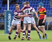 25 February 2016; David Wilkinson, Clongowes Wood College, number 10, celebrates with team-mates Barry Dooley, left, and Tim O'Brien after scoring his side's fourth try. Ireland Leinster Schools Junior Cup Round 2, CBC Monkstown v Clongowes Wood College. Donnybrook Stadium, Donnybrook, Dublin. Picture credit: Cody Glenn / SPORTSFILE