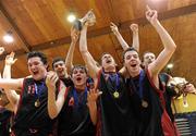 27 January 2010; St. Eunans players celebrate with the cup. All-Ireland School Cup Finals 2010 - U19 Boys B Final, St. Eunans, Letterkenny v Chanel College, Dublin, National Basketball Arena, Tallaght, Dublin. Picture credit: Brian Lawless / SPORTSFILE