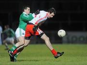 27 January 2010; Justin McMahon, Tyrone, in action against Mathew Keenan, Fermanagh. Barrett Sports Lighting Dr. McKenna Cup Semi-Final, Tyrone v Fermanagh, Healy Park, Omagh, Co. Tyrone. Picture credit: Oliver McVeigh / SPORTSFILE
