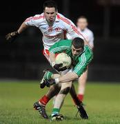 27 January 2010; Michael Jones, Fermanagh, in action against Kyle Coney, Tyrone. Barrett Sports Lighting Dr. McKenna Cup Semi-Final, Tyrone v Fermanagh, Healy Park, Omagh, Co. Tyrone. Picture credit: Oliver McVeigh / SPORTSFILE