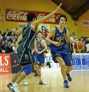 30 January 2010; Daniel James, UCD Marian, Dublin, in action against George Rahmani, Maree, Galway. Men’s Under-20 National Cup Final, UCD Marian, Dublin v Maree, Galway, National Basketball Arena, Tallaght, Dublin. Photo by Sportsfile