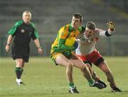 30 January 2010; Leo McLoone, Donegal, in action against Dermot Carlin, Tyrone. Barrett Sports Lighting Dr. McKenna Cup Final, Donegal v Tyrone, Brewster Park, Enniskillen, Co. Fermanagh. Picture credit: Oliver McVeigh / SPORTSFILE