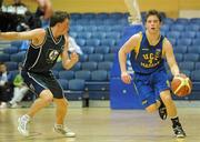 30 January 2010; Cathal Finn, UCD Marian, Dublin, in action against Con Crowley, Maree, Galway. Men’s Under-20 National Cup Final, UCD Marian, Dublin v Maree, Galway, National Basketball Arena, Tallaght, Dublin. Photo by Sportsfile