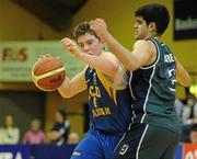 30 January 2010; Cathal Finn, UCD Marian, Dublin, in action against George Rahmani, Maree, Galway. Men’s Under-20 National Cup Final, UCD Marian, Dublin v Maree, Galway, National Basketball Arena, Tallaght, Dublin. Photo by Sportsfile