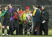 30 January 2010; Stephen O'Neill, Tyrone, leaves the field to be taken away in an Ambulance with a suspected broken elbow. Barrett Sports Lighting Dr. McKenna Cup Final, Donegal v Tyrone, Brewster Park, Enniskillen, Co. Fermanagh. Picture credit: Oliver McVeigh / SPORTSFILE