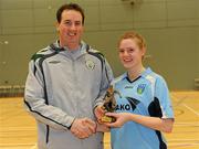 30 January 2010; Ger Dunne, FAI, presents Kellen Brink, UCD, with her player of the tournement trophy. WSCAI National Futsal Cup Final, UCC v UCD, Kingfishers Sports Centre, NUIG, University Road, Galway. Picture credit: Matt Browne / SPORTSFILE