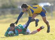 31 January 2010; Enda Varley, Mayo, in action against Stephen Ormsby, Roscommon. Connacht FBD League, Section A, Round 3, Roscommon v Mayo, Ballinlough GAA Grounds, Ballinclough, Co. Roscommon. Picture credit: Ray Ryan / SPORTSFILE