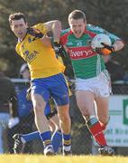 31 January 2010; Andy Moran, Mayo, in action against John Rodgers, Roscommon. Connacht FBD League, Section A, Round 3, Roscommon v Mayo, Ballinlough GAA Grounds, Ballinclough, Co. Roscommon. Picture credit: Ray Ryan / SPORTSFILE