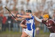 31 January 2010; John Rowney, Laois, in action against Pat Holland, Galway. Walsh Cup Quarter-Final, Laois v Galway, Kelly Daly Park, Rathdowney, Co. Laois. Picture credit: David Maher / SPORTSFILE