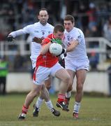 31 January 2010; Ronan Carroll, Louth, in action against Dermot Earley, left, and David Whyte, Kildare. O'Byrne Cup Semi-Final, Kildare v Louth, St Conleth's Park, Newbridge, Co. Kildare. Picture credit: Barry Cregg / SPORTSFILE