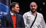 26 February 2016; WBA, IBF, WBO, IBO Heavyweight Champion Tyson Fury, right, in conversation with promoter Eddie Hearn. Carl Frampton v Scott Quigg - IBF & WBA Super-Bantamweight World Unification Title Fight Weigh-In. Manchester Arena, Manchester. Picture credit: Ramsey Cardy / SPORTSFILE