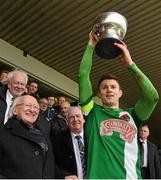 27 February 2016; President of Ireland Michael D. Higgins presents the President's Cup to Cork City captain John Dunleavy. President's Cup Final, Cork City v Dundalk, Turners Cross, Cork. Picture credit: David Maher / SPORTSFILE