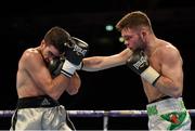 27 February 2016; Conrad Cummings, right, exchanges punches with Victor Garcia during their middleweight bout. Manchester Arena, Manchester, England. Picture credit: Ramsey Cardy / SPORTSFILE