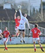 31 January 2010; Dermot Earley, Kildare, wins a high ball against Ronan Carroll, Louth. O'Byrne Cup Semi-Final, Kildare v Louth, St Conleth's Park, Newbridge, Co. Kildare. Picture credit: Barry Cregg / SPORTSFILE