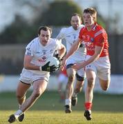 31 January 2010; Robert Kelly, Kildare, in action against Declan Byrne, Louth. O'Byrne Cup Semi-Final, Kildare v Louth, St Conleth's Park, Newbridge, Co. Kildare. Picture credit: Barry Cregg / SPORTSFILE