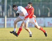 31 January 2010; David Lyons, Kildare, in action against Mark Brennan, Louth. O'Byrne Cup Semi-Final, Kildare v Louth, St Conleth's Park, Newbridge, Co. Kildare. Picture credit: Barry Cregg / SPORTSFILE