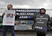 3 February 2010; John Carmody, of the Animal Rights Action Network (ARAN), and Green Party Member Trish Forde-Brennan, demonstrate outside Powerstown Park ahead of the days coursing. 85th National Coursing Meeting - Wednesday, Powerstown Park, Clonmel, Co. Tipperary. Picture credit: Brian Lawless / SPORTSFILE
