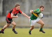 30 January 2010; James O'Donoghue, Kerry, in action against Peter Crowley, University College Cork. Munster GAA McGrath Cup Senior Football Final, Kerry v University College Cork, Austin Stack Park, Tralee, Co. Kerry. Picture credit: Brendan Moran / SPORTSFILE